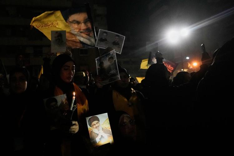 Photos show Hezbollah supporters honoring slain leaders Nasrallah and Safieddine despite PM's ban