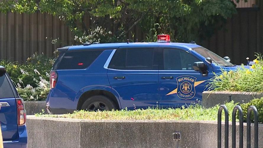 Police investigate a shopping mall shooting that left 2 dead in suburban Detroit