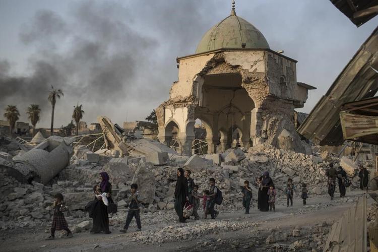 UNESCO finds Islamic State group-era bombs in Mosul mosque walls, years after the defeat of IS