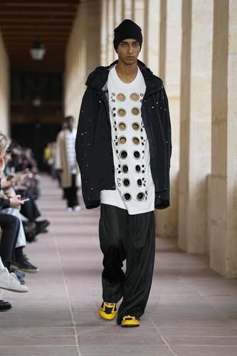 Fashion, star power and a martial aura fuse at Givenchy's collection at Paris Fashion Week