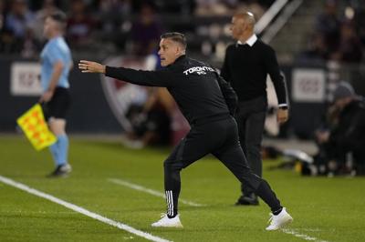 John Herdman keeping busy while he looks for the next coaching job