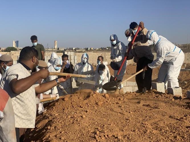 Searchers look for more than 10,000 missing in flooded Libyan city where death toll eclipsed 11,000