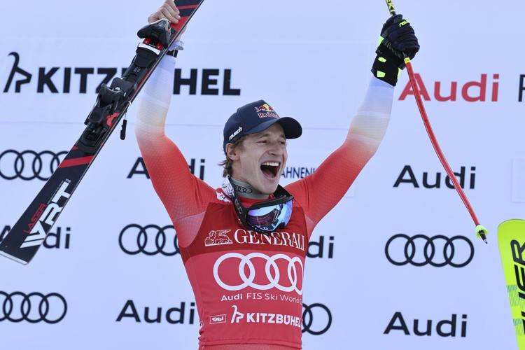Swiss skier Marco Odermatt takes eventful World Cup super-G for 1st win in Kitzbuehel