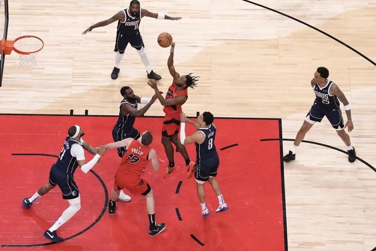 Doncic's triple-double leads Mavs to win over Raptors, snap two-game losing skid