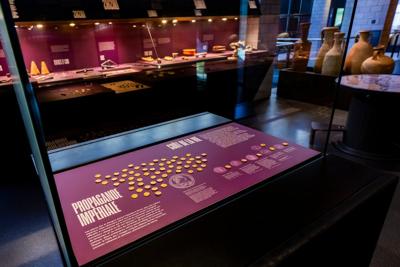 2 robbers overpower a guard and steal dozens of ancient gold coins from a Swiss museum