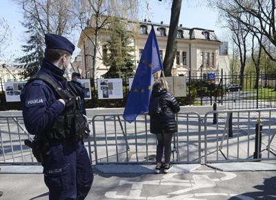 Poland lawmakers back law intended to release EU funds