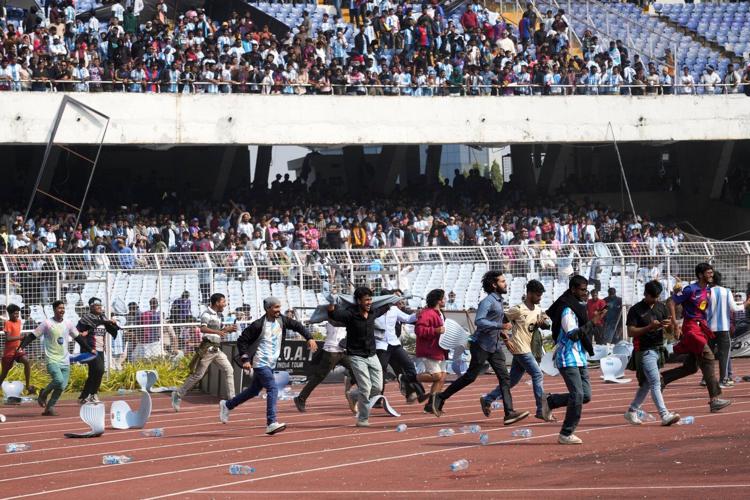 Messi's tour of India gets off to chaotic start as angry fans storm field