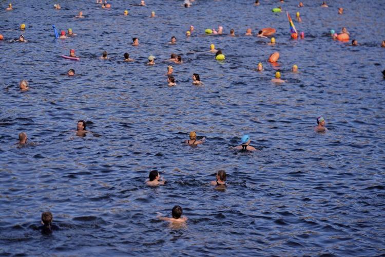 Berliners jump into the Spree River to show its clean enough for swimming