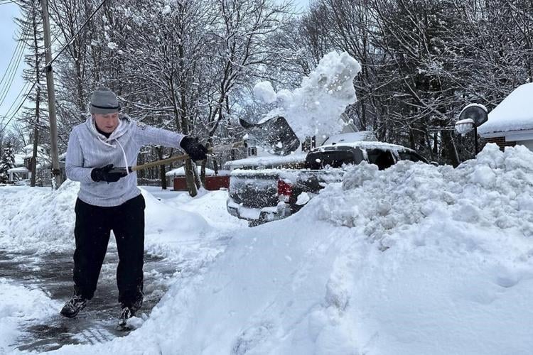 Northeast digs out from winter storm, faces power outages