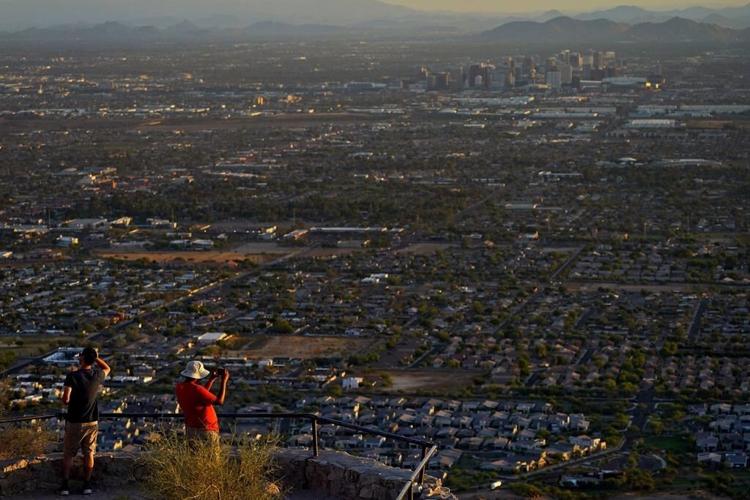 As he leaves Phoenix's blistering sun, AP's climate news director reflects on desert life