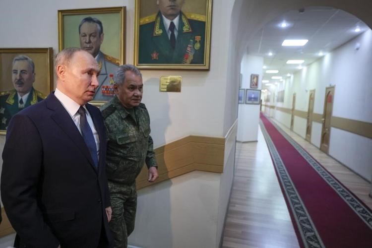 Putin and top military leaders visit southern military headquarters to assess his war in Ukraine