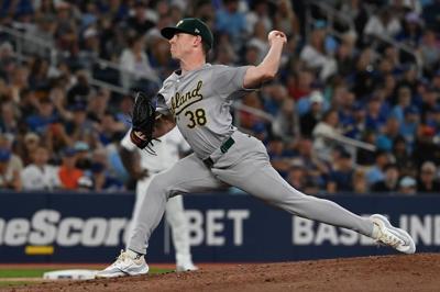 Guerrero's hit streak comes to an end as Blue Jays lose 8-4 to Athletics