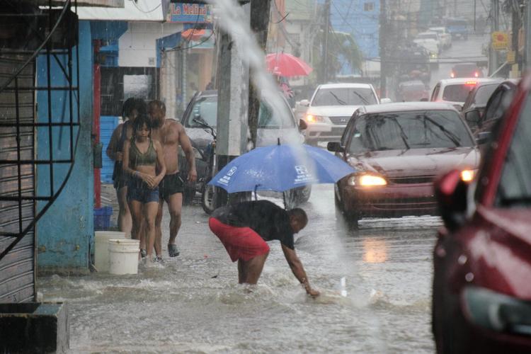 Tropical Storm Melissa stationary in the Caribbean as 4 deaths reported and huge rains expected