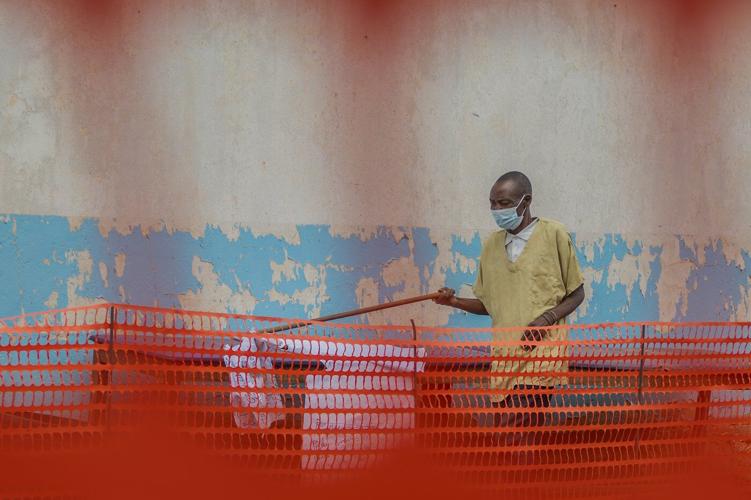 Residents burn an Ebola center in Congo as fear and anger grow over the outbreak