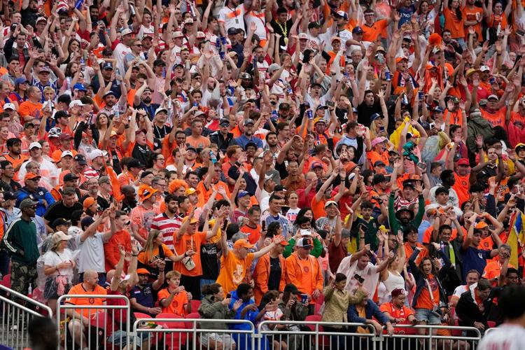 Brian Brobbey and the Dutch roll in the rain to a 3-1 win over Tunisia to top World Cup Group F