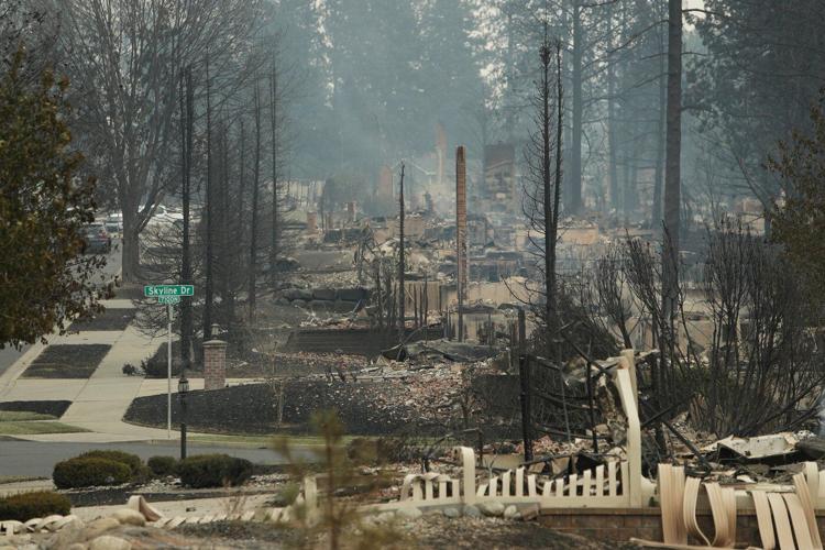 Washington state fires destroy hundreds of structures and force Spokane-area residents to evacuate
