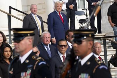Arlington ɫֱ Cemetery worker was 'pushed aside' in Trump staff dispute but won't seek charges