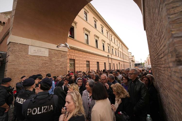 Thousands pay final respects to Pope Francis as Vatican considers extending public viewing