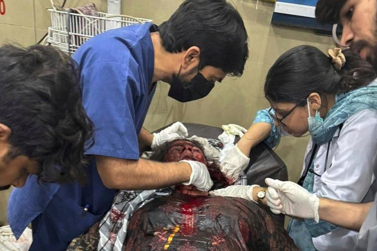 The Latest: India fires missiles across the border with Pakistan