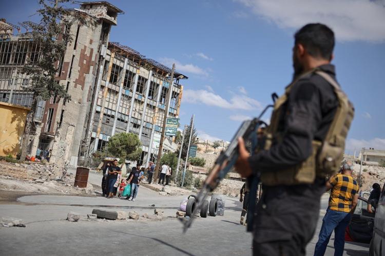 Cautious calm in Aleppo after clashes between Syrian forces and Kurdish fighters