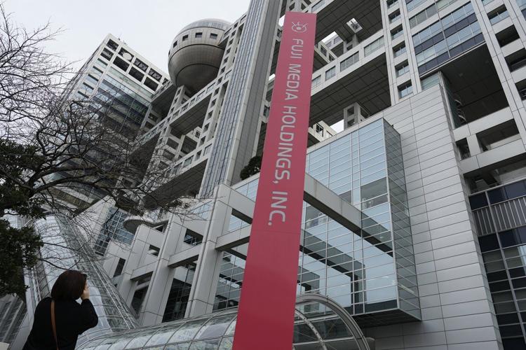 Executives at Japan`s Fuji TV and parent firm resign over a sex scandal linked to a former star