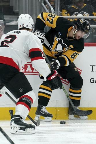Crosby's OT power-play goal lifts Penguins to 1-0 win over Senators