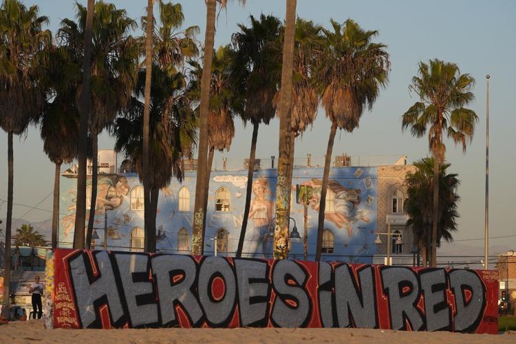 Southern California faces new wildfire warnings as near hurricane-force winds regain strength