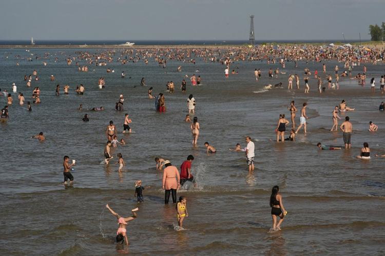 Eastern half of US sweltering again, with dangerous heat wave expected to last until midweek