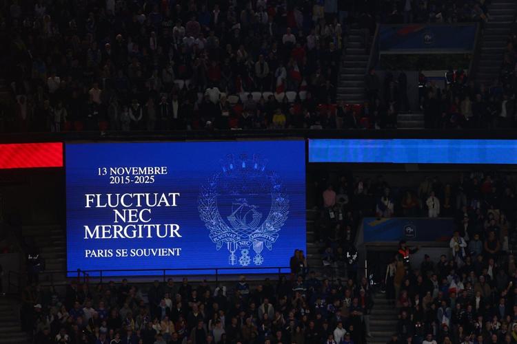 Players and fans remember victims of 2015 Paris terror attacks before France-Ukraine soccer match