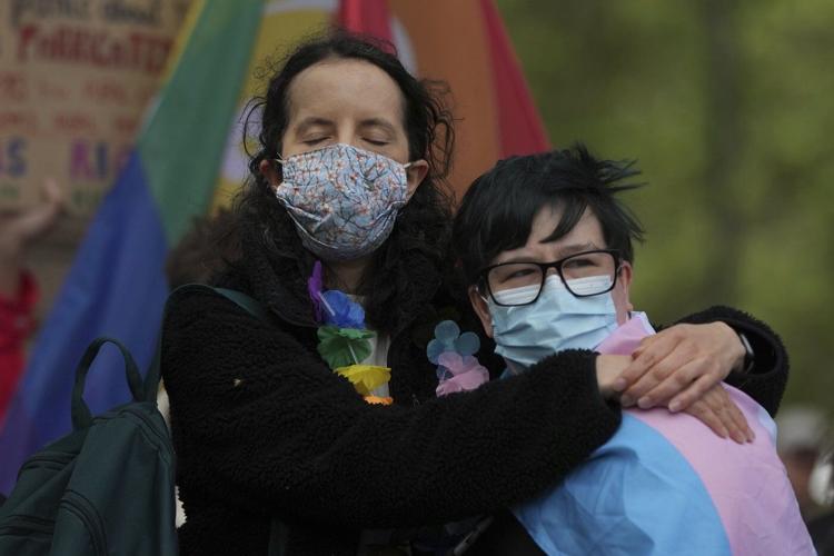 Thousands gather in London to support trans rights following UK ruling over definition of woman