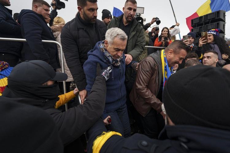 Tens of thousands of anti-government protesters hold rally ahead of Romania's election rerun