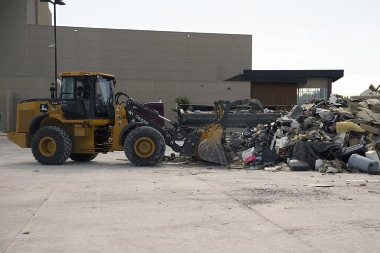 Minnesota family that lost home to flood vows to reopen store as more storms hit the northeast