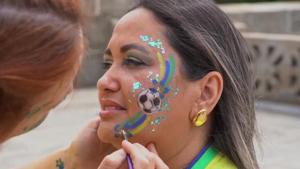 Face-painting artist helps World Cup fans show national pride