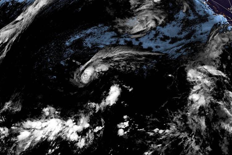 Lala is again a tropical storm, sending drenching rain and winds across the Hawaiian islands