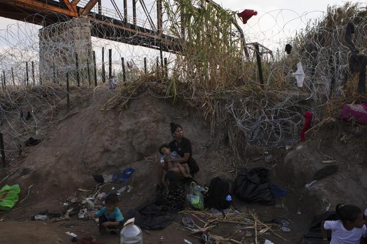 With temporary status for Venezuelans, the Biden administration turns to a familiar tool