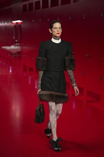 Valentino's Michele upends high fashion by setting Paris show inside staged public toilets