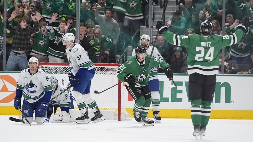 Hintz and Robertson lead Stars past Canucks 5-3 for 4th straight win