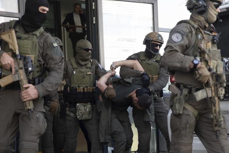 Serbia demands that NATO takes over the policing of Kosovo's north after a deadly shootout