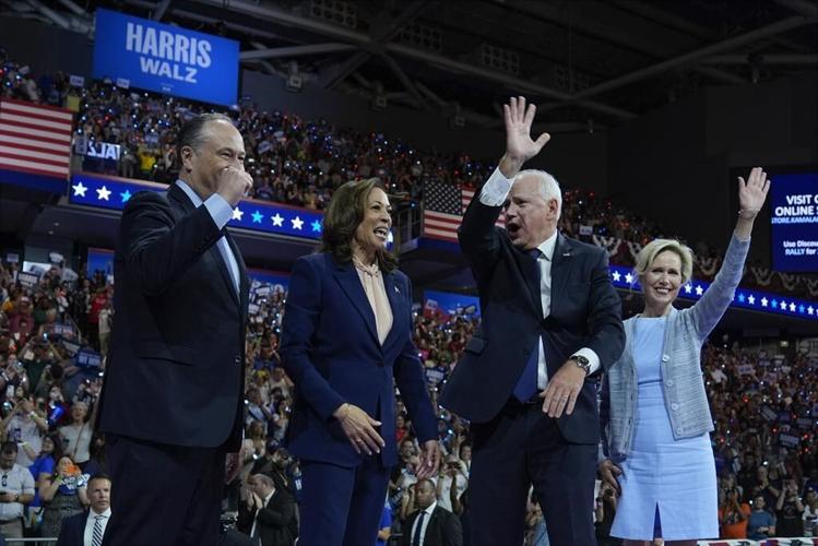 The Latest: Harris and Walz debut at Philadelphia rally