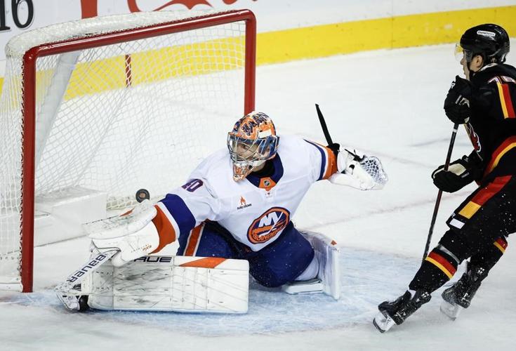 Dustin Wolf solid as Flames hang on for 2-1 shootout win over Islanders