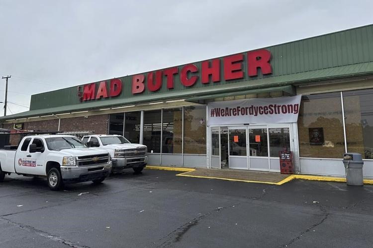 Mass shooting shutters Arkansas town's only grocery store - for now