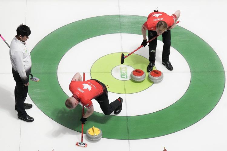 Canada rolls to comfortable win over China at world men's curling playdowns
