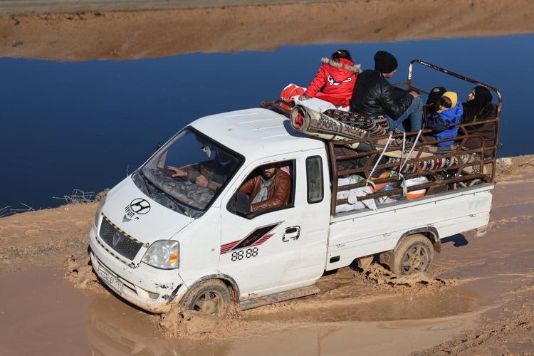 Civilians flee on foot as Syrian military offensive looms east of Aleppo