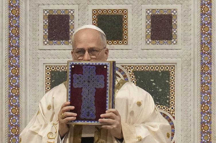 Pope Leo XIV declares 'I am Roman!' as he completes formalities to become bishop of Rome