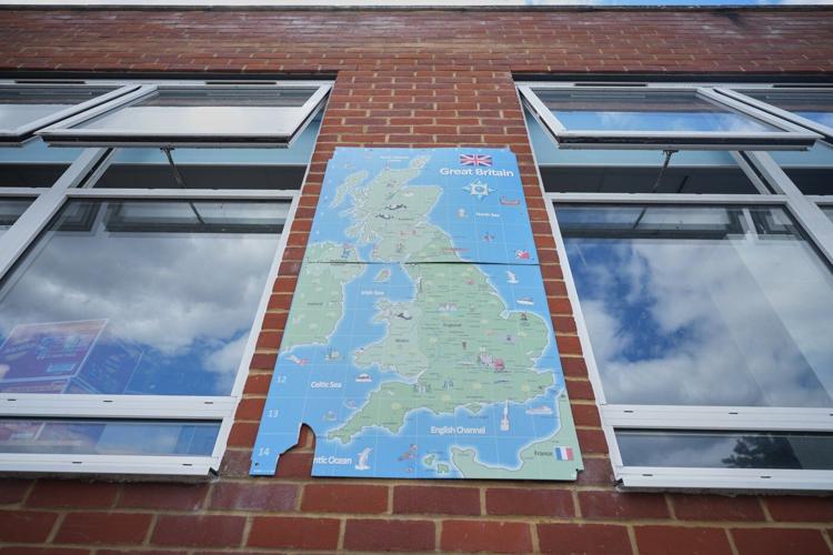 With poor ventilation and children packed in, UK's outdated schoolhouses swelter in the heat
