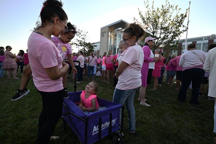 Women in pink rally in support of Lindsay Clancy who is on trial for killing 3 children
