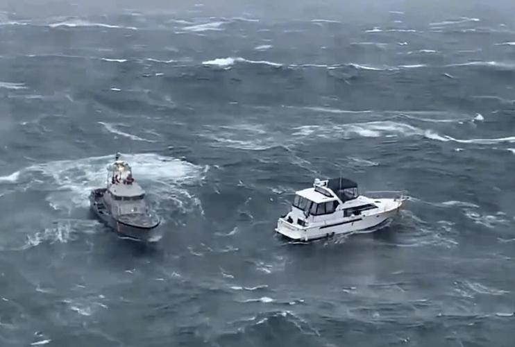 Coast Guard makes dramatic rescue as wave rolls yacht