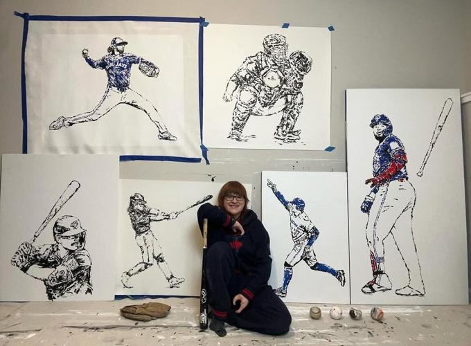 Artist uses baseball bats and balls to create paintings of Blue Jays