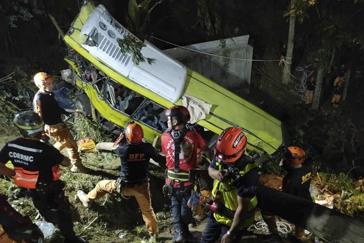 At least 16 dead and 12 injured as passenger bus falls off ravine in central Philippines