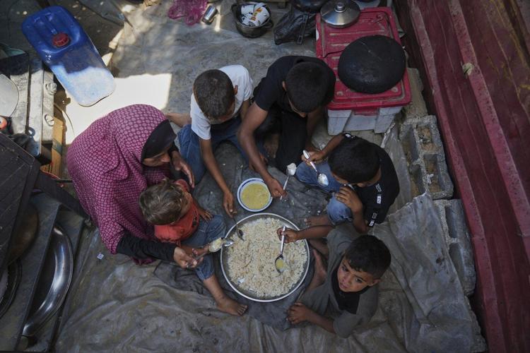 Gaza marks the start of Eid with outdoor prayers in the rubble and food growing ever scarcer